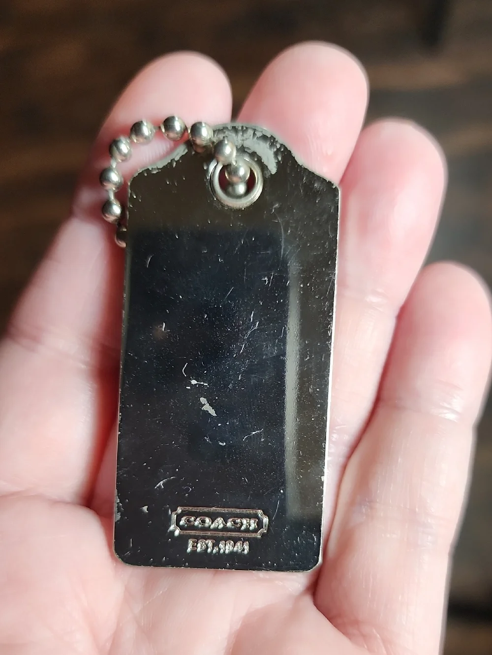 Coach Y2K Nickel Hangtag